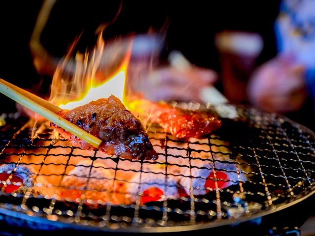 BBQ Over Open Flame On A Grill